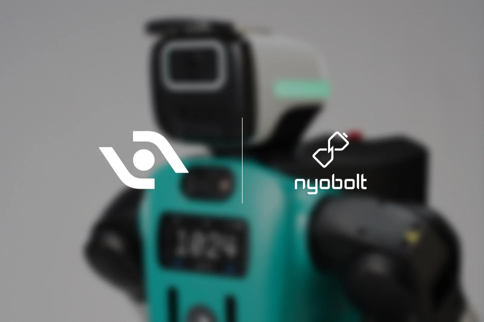 Agility Robotics and Nyobolt logos over a blurred photo of a teal and black Digit humanoid robot