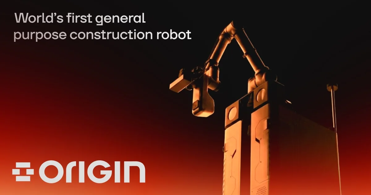 Origin press image of the OG-1 construction robot, a tall column on a wheeled base with a jointed arm and tool head, lit orange against a black background, with the words World's first general purpose construction robot